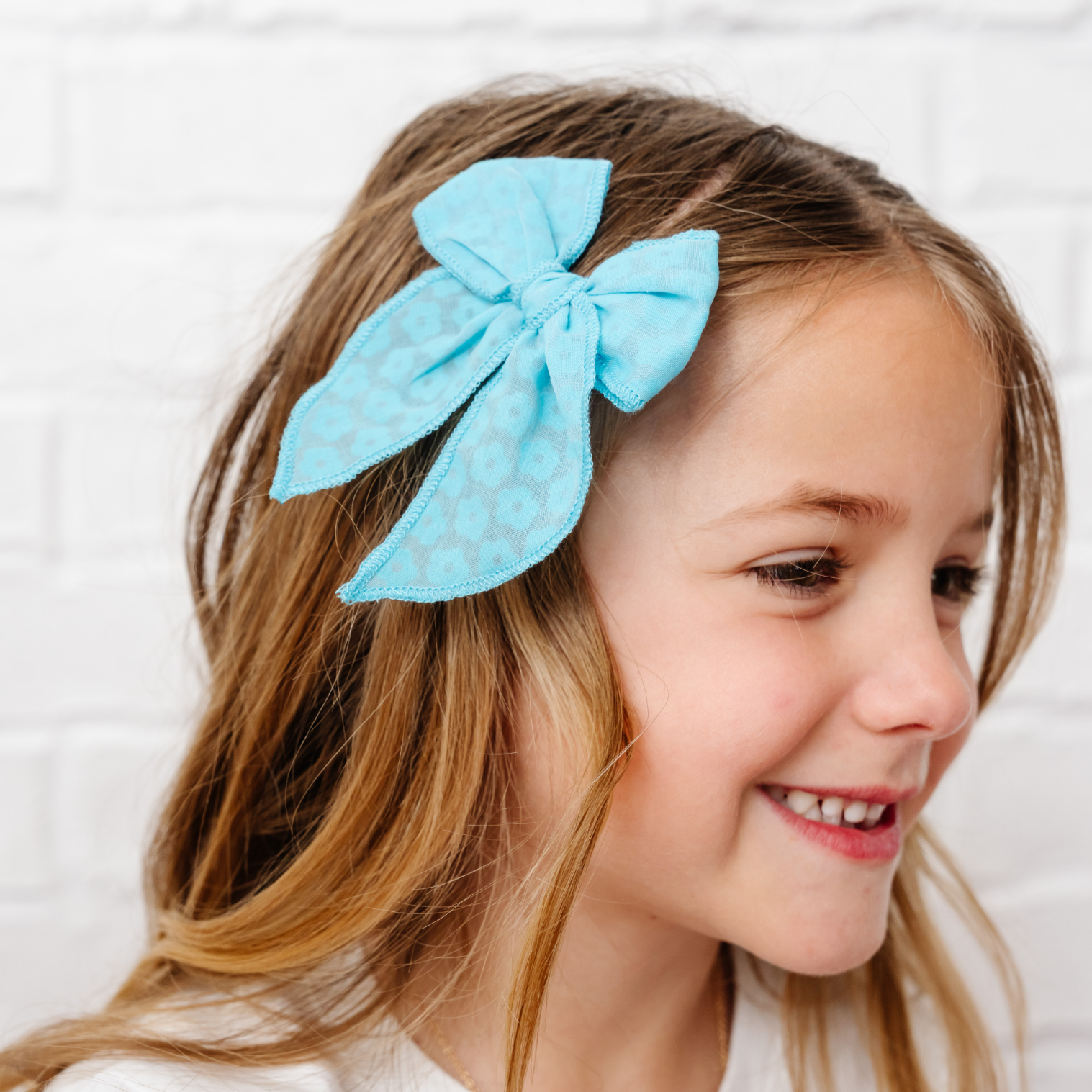 Laguna Ditsy Daisy Bow Clip